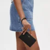 Muñequera COACH